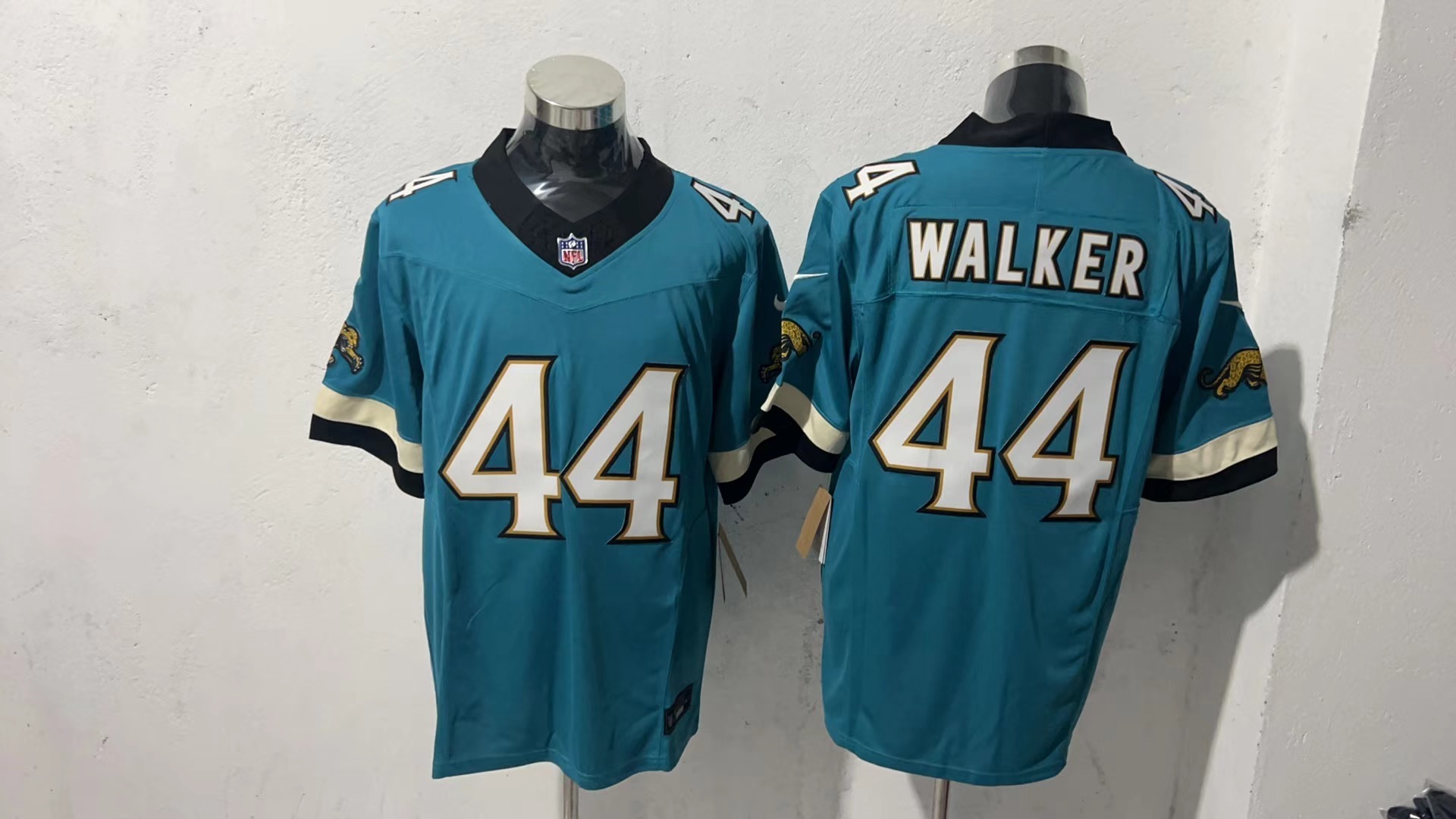 Travon Walker #44 Jacksonville Jaguars Teal Prowler Throwback Jersey — supplier front and back